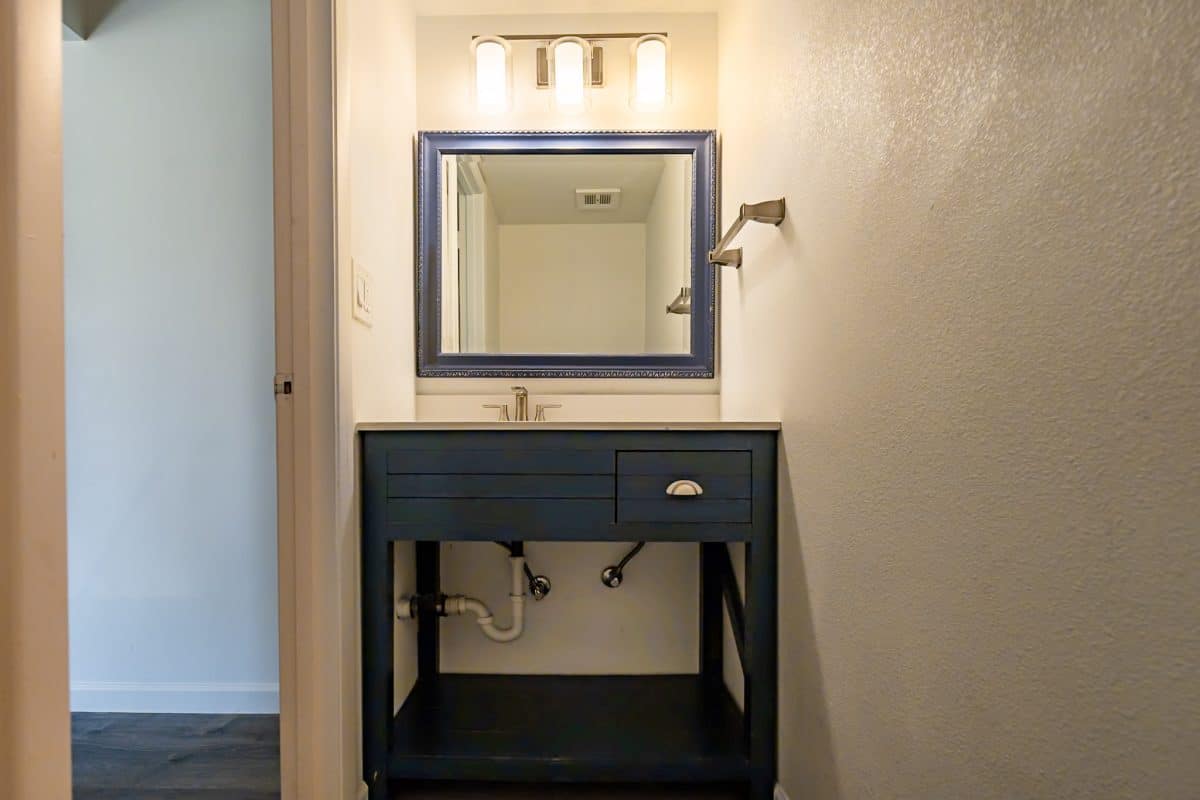 Downstairs half bath vanity and sink